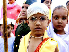 A boy dressed up as Mahatma Gandhi on the occasion of Gandhi Jayanti.