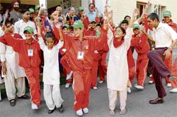 IN GAY ABANDON: Students of Army Goodwill School, Kargil, and the Institute for the Blind, Sector 26, in a joyous mood in Chandigarh on Wednesday.