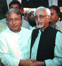 Amjad Ali Khan with Vice-President Hamid Ansari during the Iftar party of Sheila Dikshit in the Capital on Wednesday.
