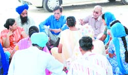 Volunteers of Kiran, an NGO, counselling patients in Jalandhar