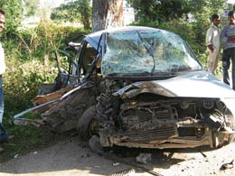 The mangled remains of a car smashed by a tipper on the Pathankot-Mandi highway at Raja Ka Bagh on Wednesday night, leaving one person dead and three injured. The driver of the tipper fled after the accident.