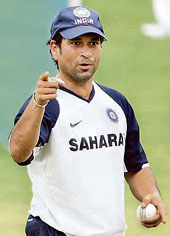 Sachin Tendulkar gestures to an unseen teammate during a training session at the Rajiv Gandhi International cricket stadium in Hyderabad on Thursday on the eve of the third one-day international cricket match between India and Australia.