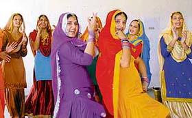 Students of GCG-42 present a Punjabi folk dance on the concluding day of NSS camp at their college in Chandigarh