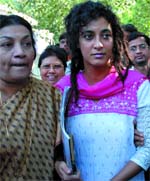 Former model Geetanjali Nagpal (right) arrives at the Patiala House court in the Capital on Friday. Nagpal, who is under the care of the Delhi Commission for Women was admitted to Vimhans recently, after she was found begging in the streets