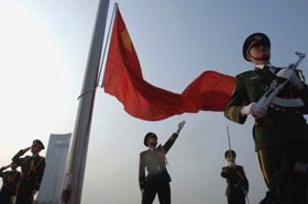 Chinese soldiers at a flag-raising ceremony