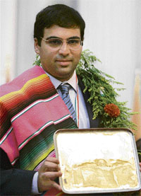 The world champion with his prized trophy in Mexico City
