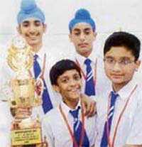 Antarpreet Singh, Mitash, Puneetinder Singh and Sanil Diwan of Sacred Heart Convent School, Sarabha Nagar, Ludhiana, who won the title in the CBSE North Zone II Badminton Championship held at BCM Arya Model Senior Secondary School,, Ludhiana.