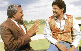 A file picture coach Azad with a young Kapil Dev