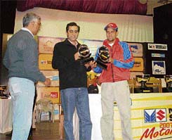 Raid-De-Himalaya champion Suresh Rana of Kullu is felicitated by Sameer Kohli, head (marketing), Bharti Airtel, HP, at the prize distribution ceremony in Manali on Sunday.