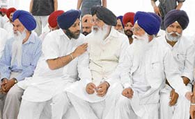 Punjab Chief Minister Parkash Singh Badal, acting president, SAD, Sukhbir Badal and KIrpal Singh Badungar at a function near Patran