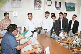 Lawyers present a memorandum to Kangra DC Ashwani Kapoor at Dharamsala on Monday.