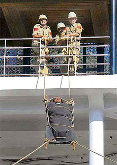 Fire-fighters test their skills during a mock drill at The Ridge as part of the Disaster Management Fair, 2007, in Shimla on Monday.