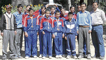 Students with their medal and trophy.
