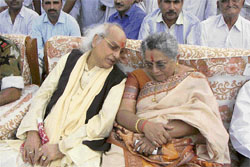 Pandit Jasraj speaks to his wife Madhura during a function at the maestros native village, Pilimandori, in Fatehabad on Tuesday.