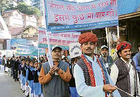 Participants from various states take part in a commitment rally on the concluding day of the Disaster Management Fair, 2007, at Shimla on Wednesday.