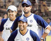 Sachin Tendulkar (front), Yuvraj Singh and Rohit Sharma (left) during the practice session on the eve of fifth ODI against Australia at Reliance Stadium in Vadodara