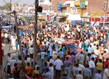 Protesters block traffic in Karnal on Thursday following the death of a councillor.