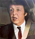 Sir Paul McCartney arrives at the family arbitration building of the high court in central London on Thursday. Former Beatle and his estranged wife, Heather Mills, arrived to hammer out details of potentially one of the costliest divorce settlements in British legal history.