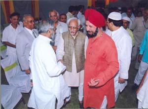 Hacharan S. Josh with Vice-President Mohd Hamid Ansari at the Iftar function in the Capital on Friday