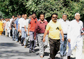 Journalists of Bilaspur district take out a silent protest march to the Collectorate at Bilaspur on Friday afternoon in protest against the registration of a sedition case against three journalists at Shimla. They presented a memorandum to DC Rajinder Singh for onward submission to the Chief Minister and the Governor, demanding immediate withdrawal of the case