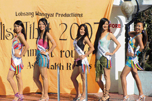 Participants of the Miss Tibet, 2007, pose for photographers during the swimsuit round at McLeodganj, Dharamsala, on Friday