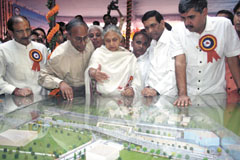 Delhi Chief Minister Sheila Dikshit with MP Sandeep Dikshit, PWD minister Raj Kumar Chauhan and former DPCC president Ram Babu Sharma look at a model of underpasses and flyovers after the foundation stone laying ceremony at the Shyamlal College crossing in East Delhi on Saturday.