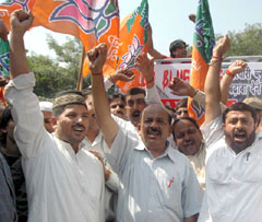 BJP activists shout slogans against Blueline buses at Shahid Park near ITO on Saturday.