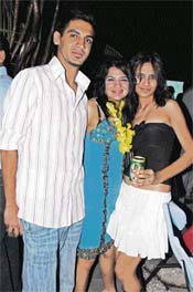 Young professionals chill out at a part