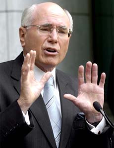 Australian Prime Minister John Howard speaks during a press conference in Canberra
