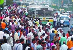Crowd at the ITO bus stand as Blueline bus operators announce strike in the Capital on Monday. 