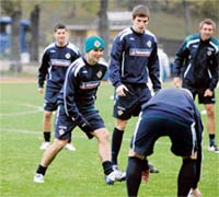 Northern Ireland's David Healy (with green hat) takes part in a soccer training session at Kristinebergs arena in Stockholm on Monday. Northern Ireland will play a Euro 2008 qualifier against Sweden in Stockholm on Wednesday. 