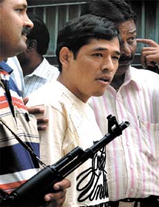 Milan Lama, who carries a reward of Rs 50,000 on his head being paraded before the media by the Delhi Police in the Capital