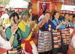 Members of the Bharat-Tibet Sahayog Manch celebrate the US Congressional Golden Award to the Dalai Lama on the eve of opening of annual Tibetian Potala Bazaar in Ranchi on Thursday.