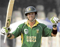 South Africas AB de Villiers celebrates after completing his century during the first one-dayer against Pakistan in Lahore on Thursday