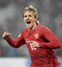 Russias Roman Pavlyuchenko celebrates after scoring against England during the Euro 2008 football qualifier in Moscow on Wednesday. Russia won 2-1.