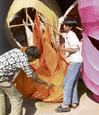 Artisans prepare an effigy of Ravana for Dussehra at Gandhi Maidan in Ambala Cantt.