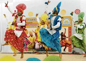 Students perform bhangra on the concluding day of the Punjabi University youth festival at Shivalik Institute of Education and Research, Mohali