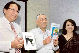 Manju Jaidka (right), professor of English at PU, poses with UT adviser Pradip Mehra (centre) and vice-chancellor Prof R.C. Sobti at a book release function in Chandigarh