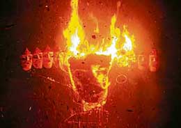 The effigy of Ravana goes up in smoke at the Sector 17 parade ground in Chandigarh on Sunday.