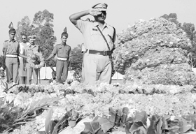 Police officers of Haryana lay wreaths at a memorial at Police Lines in Moginand village near Panchkula on Sunday to mark the 48th state-level Police Commemoration Day