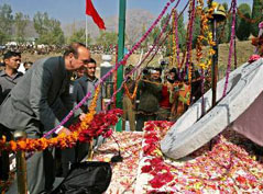 Chief Minister Ghulam Nabi Azad lays a wreath at the memorial, set up in the honour of police martyrs, on the occasion of the Police Commemoration Day at the J and K Armed Police complex, Zewan, near Srinagar, on Sunday.