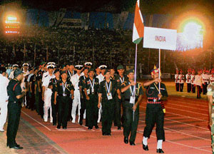 Members of the Indian contingent march during the closing ceremony of the 4th Military World Games at the GMC Balayogi Stadium in Hyderabad on Sunday.
