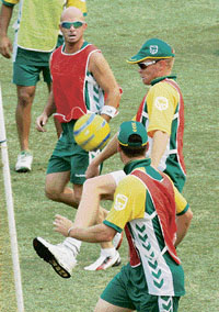 South Africas Herschelle Gibbs and Shaun Pollock (right) play football during a practice session at the Iqbal Stadium in Faisalabad on Monday.