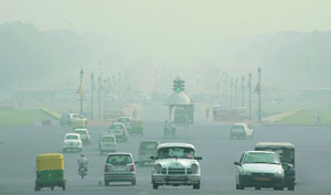 Haze on Wednesday morning lowered the visibility affecting traffic around the India Gate in the Capital.