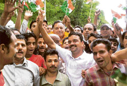 Former transport and tourism minister G.S. Bali during a door-to-door campaign with his supporters in Nagrota Bagwan