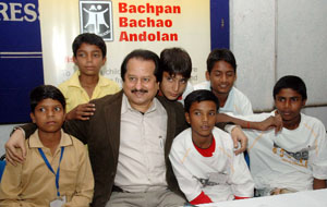 Singer Pankaj Udas with children during Ek Shaam Bachpan Ke Naam at Press Club in the Capital on Friday.