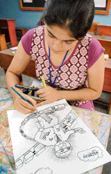 Girl sketches a cartoon in a cartoon making competition on the second day of the Youth Festival ‘Fusion 2007’ organised by BCM Arya Model School.