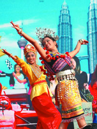 A dance troupe performs at the Malaysia tourism festival in the Capital on Saturday.