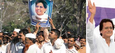 BSP supporters, who turned out in large numbers, hold their leader Mayawatis poster at a rally in Chandigarh on Sunday; and (right) Harmohan Dhawan, who was declared BSPs nominee for the next parliamentary elections, waves at the crowd