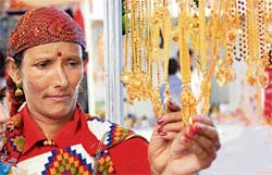 A woman busy in Karva Chauth shopping in Lower Bazaar, Shimla